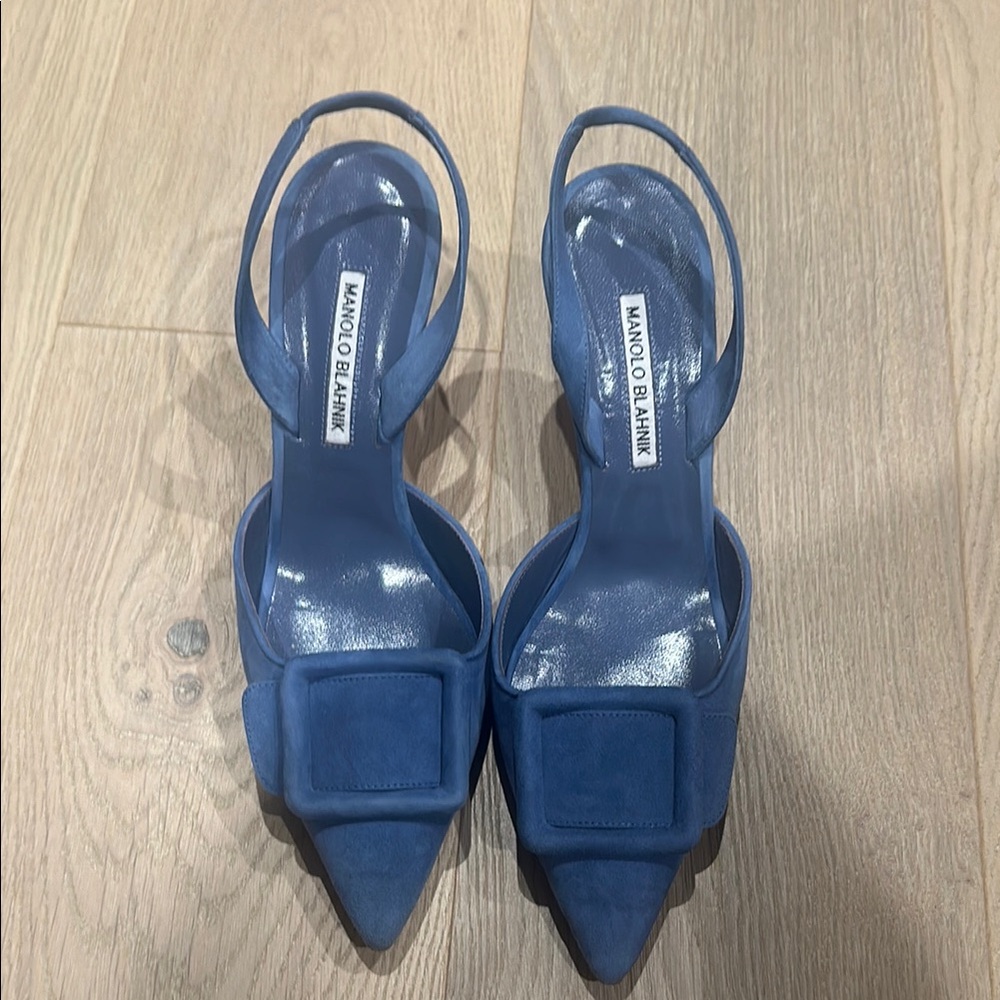 Manolo Blahnik Blue Heels with Elegant Slingback Design